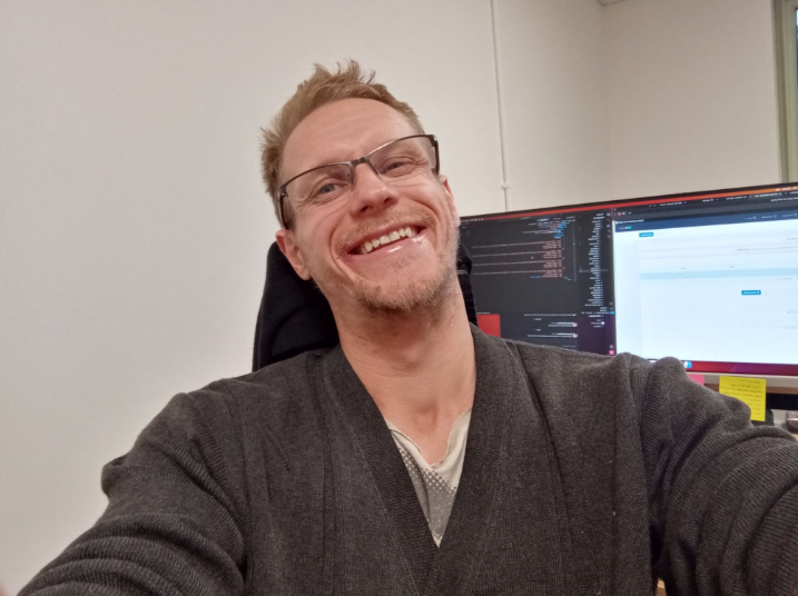 image of man at desk